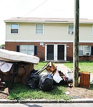 Piles of belongings like these outside a row of apartments in North Jackson Ward could become more common in Richmond and elsewhere. Evictions are predicted to skyrocket in coming months without government intervention to help millions of people struggling to pay rent as jobs and businesses have been lost during the pandemic.