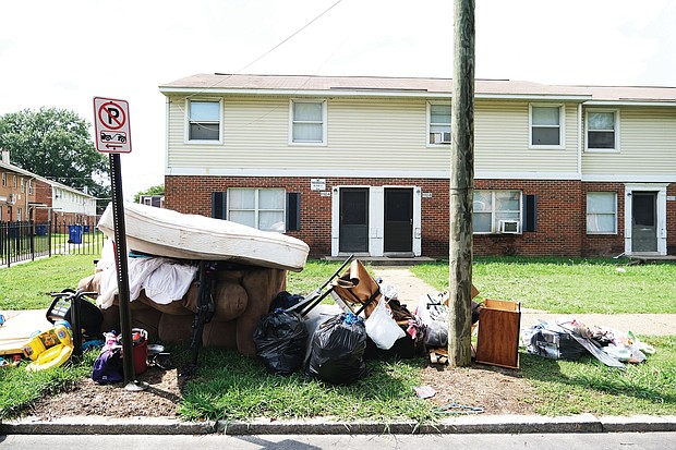 Piles of belongings like these outside a row of apartments in North Jackson Ward could become more common in Richmond and elsewhere. Evictions are predicted to skyrocket in coming months without government intervention to help millions of people struggling to pay rent as jobs and businesses have been lost during the pandemic.