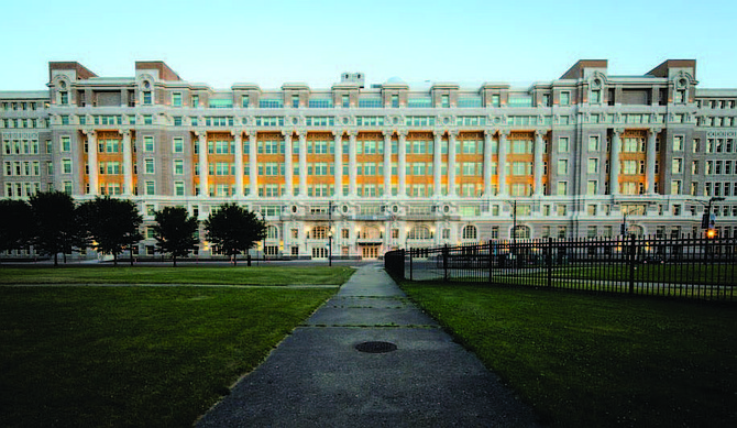 The exterior of the old Cook County Hospital building features a fully restored facade that required more than 4,000 individual pieces of terra cotta to be repaired or duplicated