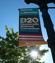 A sign advertises the convention at Wisconsin Center, home to the 2020 Democratic National Convention in Milwaukee on August 11, 2020/Credit:	Bryan R. Smith/AFP/Getty Images
