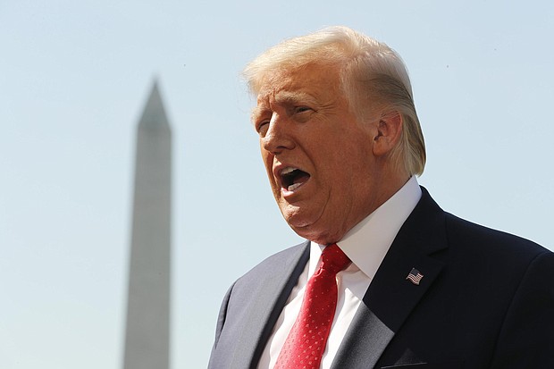 At an event aimed at highlighting the 100th anniversary of women's right to vote, President Donald Trump disparaged the country's most admired woman, Michelle Obama as "over her head" after she delivered a scathing, direct-to-camera speech criticizing him at the Democratic National Convention./Credit:	Chip Somodevilla/Getty Images North America/Getty Images