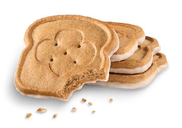 The bread-shaped cookies look like miniature slices of French toast topped with icing./Credit:	Girl Scouts of the USA