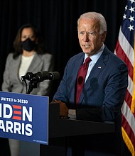 Democratic presidential candidate former Vice President Joe Biden joined by his running mate Sen. Kamala Harris, D-Calif., speaks at the Hotel DuPont in Wilmington, Del., Thursday, Aug. 13, 2020./Credit:	Carolyn Kaster/AP