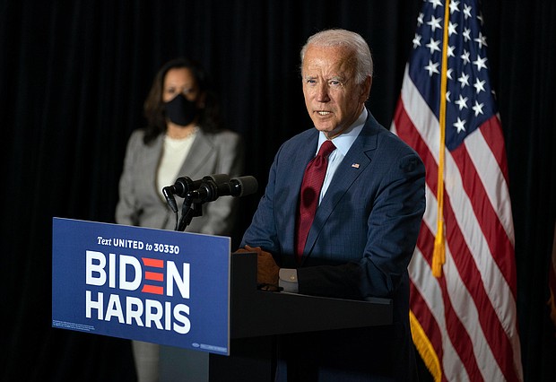Democratic presidential candidate former Vice President Joe Biden joined by his running mate Sen. Kamala Harris, D-Calif., speaks at the Hotel DuPont in Wilmington, Del., Thursday, Aug. 13, 2020./Credit:	Carolyn Kaster/AP