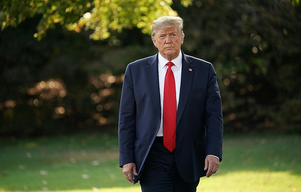 President Donald Trump said Sunday that he believed "political reasons" had slowed down the Food and Drug Administration's approval of emergency use authorization for convalescent plasma but that he "broke the logjam" over the last week./Credit:	MANDEL NGAN/AFP/Getty Images