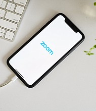 Zoom, the video conferencing app that's become a go-to for many stuck at home during the pandemic, is down in some parts of the world. In the United States, the problem seems to be affecting those in the East Coast./Credit:	Gabby Jones/Bloomberg/Getty Images