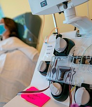 Mckinley Edelman, 26, a recovered COVID-19 patient, donates plasma to MedStar Georgetown University Hospital at Inova Blood Services on April 22, 2020 in Dulles, Virginia./Credit:	Alex Edelman/AFP/Getty Images