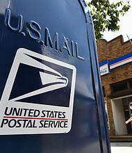 Two Democratic super PACs are launching a $7.5 million advertising campaign to encourage voters to request mail-in ballots in several states crucial to their party's hopes of winning the White House and flipping control of the Senate./Credit:	MANDEL NGAN/AFP/AFP via Getty Images