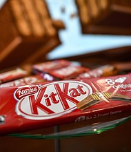 Hedge fund Infusive Asset Management says the best way to make money during the health crisis is to invest in companies that cater to indulgences like Big Macs, KitKats and Johnny Walker as well as convenience like Amazon and Netflix./Credit:	FABRICE COFFRINI/AFP/Getty Images