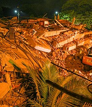 Up to 60 people are believed to be trapped after the five-story building in Mahad city collapsed./Credit:	PRITAM SAKPAL/AFP via Getty Images