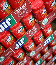 J.M. Smucker Co. Jif brand peanut butter displayed for sale. PB&J sandwiches have proven popular during the COVID-19 pandemic, resulting in double-digit sales increases for Jiff,/Credit:	Luke Sharrett/Bloomberg/Getty Images