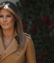 First lady Melania Trump arrives in the Rose Garden to speak at the White House May 7, 2018 in Washington, DC. Trump outlined her new initiatives, known as the Be Best program, as first lady during the event./Credit:	Win McNamee/Getty Images North America/Getty Images