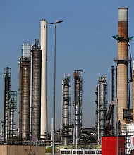 A general view of Exxonmobil or Exxon Mobil refinery in the Port of Rotterdam, Netherlands./Credit:	Dean Mouhtaropoulos/Getty Images