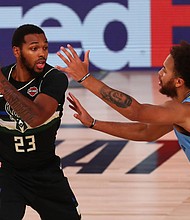 The Milwaukee Bucks decides to boycott their playoff game Wednesday with the Orlando Magic. The game broadcast on NBA TV reported the players are sitting out in protest./Credit:	Kim Klement/Pool/AP