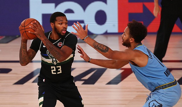 The Milwaukee Bucks decides to boycott their playoff game Wednesday with the Orlando Magic. The game broadcast on NBA TV reported the players are sitting out in protest./Credit:	Kim Klement/Pool/AP