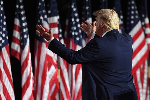 President Donald Trump pledged to create 10 million jobs in less than a year./Credit:	Saul Loeb/AFP/Getty Images