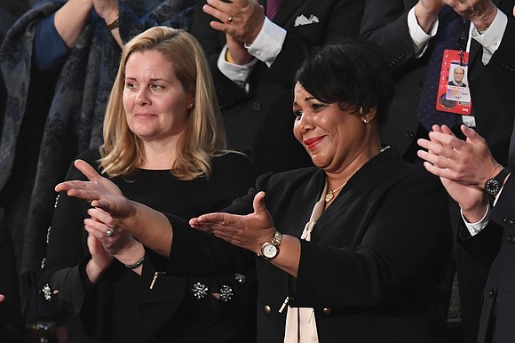 President Donald Trump granted Alice Marie Johnson a pardon on Friday, after commuting her prison sentence two years ago.