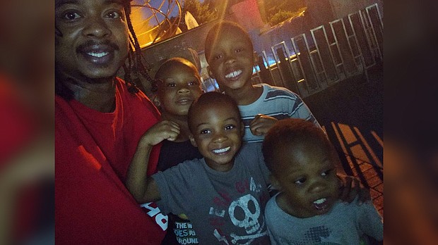 Jacob Blake was shot seven times in the back as an officer tried to detain him this week in Wisconsin. In this photo, Blake is seen with his four sons./Credit:	From Ben Crump/Twitter