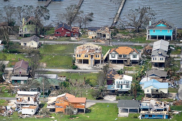 FEMA has enough money to cover unemployment and disaster relief. This image shows buildings and homes damaged in the aftermath of Hurricane Laura Thursday, August 27, near Lake Charles, LA.
Credit:	David J. Phillip/AP