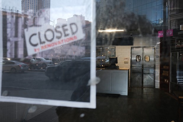 A shuttered business is shown in Brooklyn, NY. New York City. A surge in corporate bankruptcies is adding to a difficult labor market./Credit: Spencer Platt/Getty Images