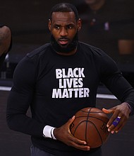 LeBron James #23 of the Los Angeles Lakers warms up before the game against the Portland Trail Blazers in Game Five of the Western Conference First Round during the 2020 NBA Playoffs at AdventHealth Arena at ESPN Wide World Of Sports Complex on August 29, 2020 in Lake Buena Vista, Florida./Credit:	Kevin C. Cox/Getty Images