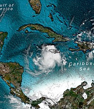 Tropical Storm Nana, heading toward Central America, is the earliest 14th named storm to form in the Atlantic Ocean./Credit:	CNN Weather