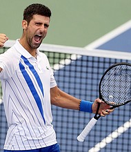 Djokovic celebrates defeating Milos Raonic in the final of the Western & Southern Open./Credit:	Matthew Stockman/Getty Images North America/Getty Images