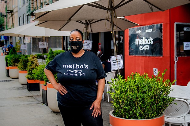 Harlem restaurateur Melba Wilson stands in front of her namesake restaurant on July 23, 2020 in Harlem, New York./Credit:	Anthony Jones