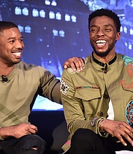 Actors Michael B. Jordan, left, and Chadwick Boseman attend the Marvel Studios' "Black Panther" Global Junket Press Conference on January 30, 2018, at Montage Beverly Hills in Beverly Hills, California./Credit:	Alberto E. Rodriguez/Getty Images