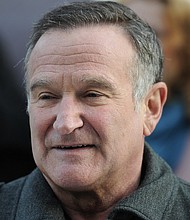 Susan Schneider Williams seeks to reclaim her husband's legacy with "Robin's Wish," which tries to balance celebrating Robin Williams' life with explaining the undiagnosed illness that resulted in his death./Credit:	CARL COURT/AFP/Getty Images