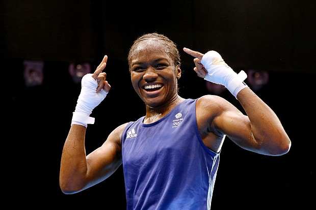 Nicola Adams celebrates winning gold at the 2012 Olympic Games in London. She recently announced her retirement due to fears she could go blind if she continues boxing./Credit:	Scott Heavey/Getty Images Europe/Getty Images