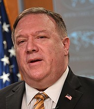 US Secretary of State Mike Pompeo speaks during a press conference at the State Department in Washington, DC on June 24, 2020. US-based senior Chinese diplomats will be required to seek US government permission to engage in a number of routine activities, Secretary of State Mike Pompeo announced Wednesday -- the latest escalation amid worsening tensions between Washington and Beijing./Credit:	Mandel Ngan/Pool/AFP/Getty Images