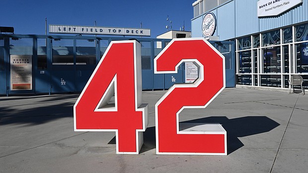 Jackie Robinson’s jersey number, 42, stands outside one of the entrances to Dodger Stadium in Los Angeles during this year’s commemoration of the trailblazing athlete on Aug. 28.