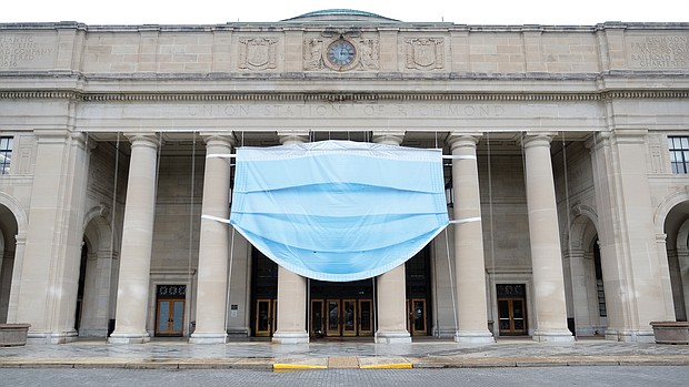 A giant symbol of the times now adorns the facade of the Science Museum of Virginia as it prepares to reopen to the public 9:30 a.m. Saturday, Sept. 5. The museum, at 2500 W. Broad St. near Downtown, has been closed to visitors for months because of the pandemic. The giant mask is a reminder that visitors will need to wear one to get in. The museum is one of many cultural spaces that are putting new requirements in place in moving from virtual events to actually welcoming visitors. In addition to the mask requirement, the museum will have visitors buy timed admission tickets in advance. It also will limit the number of people entering during operating hours. The museum currently is hosting the state Senate during the General Assembly’s special session.