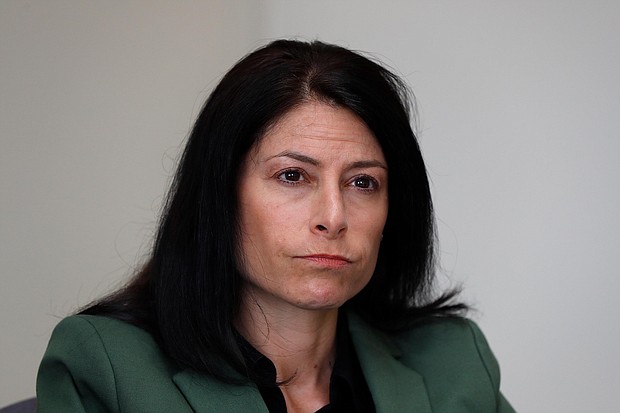 Dana Nessel, Attorney General of Michigan, reminds voters that voting twice is illegal after Trump suggests it./Credit:	Paul Sancya/AP
