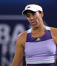 Garbine Muguruza broke her racket in two after losing on Thursday./Credit:	Francois Nel/Getty Images
