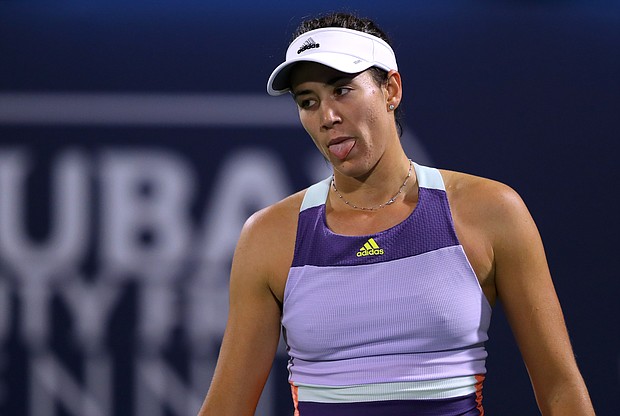 Garbine Muguruza broke her racket in two after losing on Thursday./Credit:	Francois Nel/Getty Images