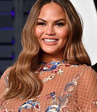 Chrissy Teigen attends the 2019 Vanity Fair Oscar Party hosted by Radhika Jones at Wallis Annenberg Center for the Performing Arts on February 24, 2019 in Beverly Hills, California./Credit:	Dia Dipasupil/Getty Images North America/Getty Images