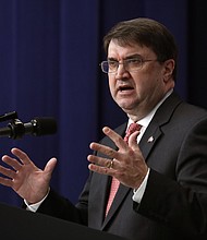 Veterans Affairs Secretary Robert Wilkie dismissed President Donald Trump's previous comments about prisoners of war as "politics" and denied the President made disparaging comments about fallen US service members./Credit:	Chip Somodevilla/Getty Images