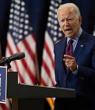 Democratic presidential candidate and former Vice President Joe Biden maintains a steady grip on the 2020 presidential race, according to recent polling./Credit:	Jim Watson/AFP/Getty Images