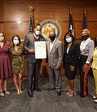 Pictured left to right: Kimberly Hatter, Debbie McNulty, Junie Hoang, Greg Carter, Mayor Sylvester Turner, Dominque Telson, Jalene Mack, Lyn Samuels
