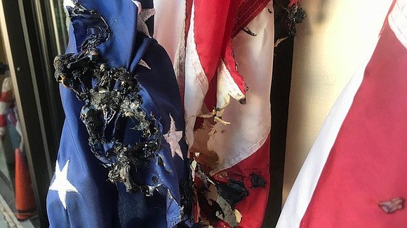 The Waynesville Kiwanis Club says someone burned several of their American flags that had been placed on local businesses.