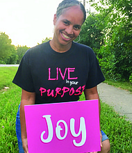 Kai Haynes wanted a way to brighten the lives of people during the COVID-19 pandemic, so she created lawn signs using bright colors. Photo courtesy of Kai Haynes