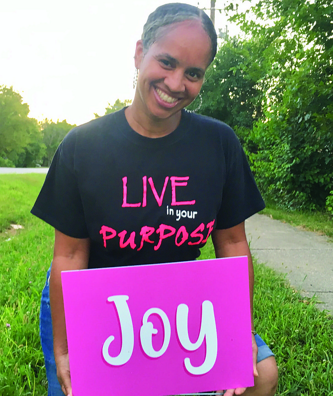 Kai Haynes wanted a way to brighten the lives of people during the COVID-19 pandemic, so she created lawn signs using bright colors. Photo courtesy of Kai Haynes