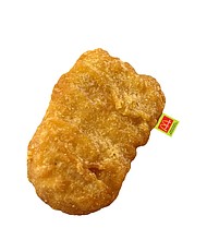 Don't bite into this. Seriously. It's not even chicken; just a pillow made to look like it./Credit:	From Travis Scott