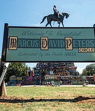 A new sign now sits on the grassy circle at Monument and Allen avenues where the Robert E. Lee statue sits. The original sign informally renaming the circle for Marcus-David Peters, a 24-year-old high school biology teacher who was shot and killed by Richmond Police officer in 2018 during what has been described as a mental crisis, was cut down by an unknown person or people around Aug. 16. State officials and law enforcement said at the time there was no official order for its removal. The new sign was put in place Aug. 30.