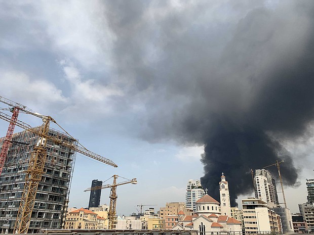 Smoke rises from a huge fire raging in Beirut port on September 10, 2020./Credit:	Joseph Eid/AFP/Getty Images