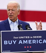 Democratic presidential candidate former Vice President Joe Biden speaks during a campaign event on manufacturing and buying American-made products at UAW Region 1 headquarters in Warren, Mich., Sept. 9, 2020./Credit:	Patrick Semansky/AP