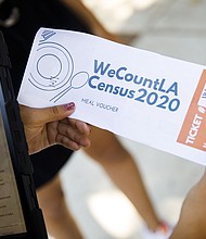 Some Los Angeles restaurants recently distributed free meal vouchers in an effort to boost census response rates./Credit:	Patrick T. Fallon/Bloomberg/Getty Images
