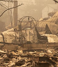 Several homes were destroyed by the Beachie Creek Fire east of Salem./Credit:	Rob Schumacher/AP